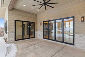 View of patio with a ceiling fan