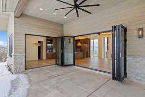 View of patio with ceiling fan