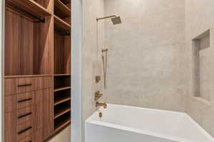 Bathroom featuring bathtub / shower combination