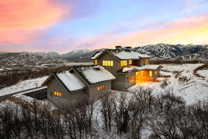 Snowy aerial view with a mountain view