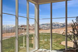 Interior space with a mountain view and plenty of natural light