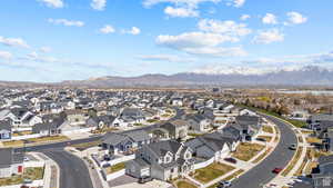 Drone / aerial view with a mountain view and a residential view