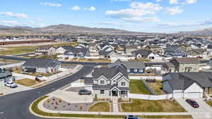 Drone / aerial view with a residential view and a mountain view