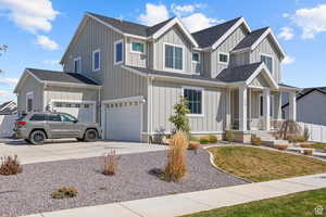 Craftsman house with board and batten siding and a porch