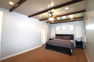 Bedroom with carpet flooring, beamed ceiling, baseboards, and recessed lighting