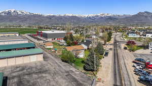 Drone / aerial view featuring a residential view and a mountain view