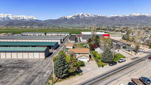 Birds eye view of property featuring a mountain view