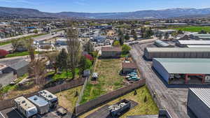 Drone / aerial view with a residential view and a mountain view