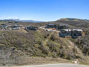 Birds eye view of property with a mountain view