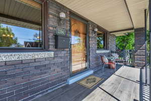 View of the front entrance featuring an east facing porch