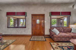 Entryway with hardwood floors