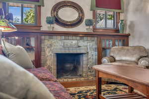 Original built in cabinets and a fireplace