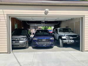 Garage featuring driveway