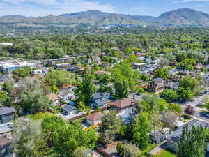 Aerial view of residential area with a mountainous background