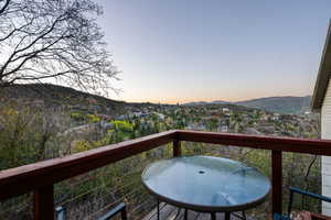 Wooden deck featuring a mountain view