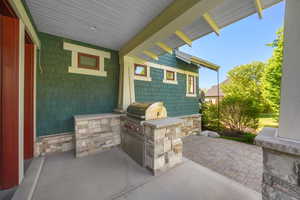 View of patio with area for grilling and grilling area