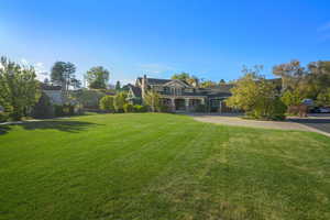 View of front of property with a front lawn