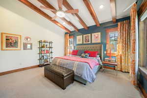Bedroom featuring baseboards, lofted ceiling with beams, recessed lighting, and carpet