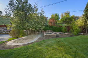 View of yard featuring fence