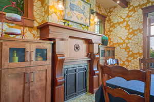 Dining area with wallpapered walls