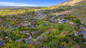 Drone / aerial view with a residential view and a mountain view