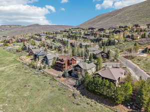 Aerial view featuring a mountain view and a residential view