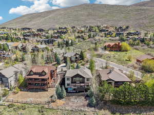 Drone / aerial view with a mountain view and a residential view