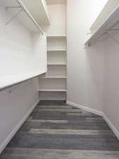 Primary bedroom walk-in closet