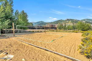 View of community featuring volleyball court and a mountain view