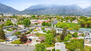 Aerial view featuring a mountain view and a residential view