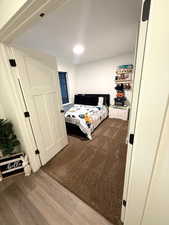 Bedroom featuring wood finished floors