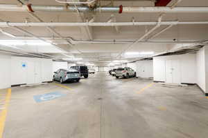 Parking deck featuring a storage shed