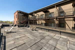 Exterior space featuring a patio and outdoor dining area