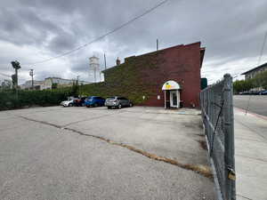 Uncovered parking lot with fence