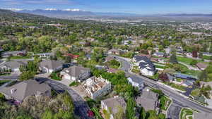 Birds eye view of property with a residential view and a mountain view
