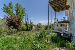 View of yard with stairway