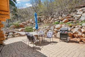 View of patio / terrace with grilling area and outdoor dining space