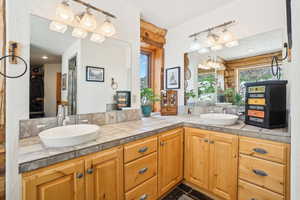 Bathroom with a sink and double vanity