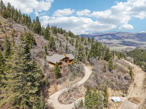 Drone / aerial view featuring a mountain view
