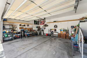 Garage featuring a workshop area