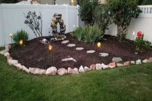 View of yard featuring fence