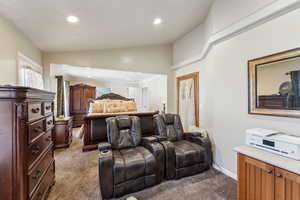 Bedroom with baseboards, carpet flooring, crown molding, and recessed lighting