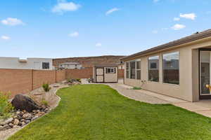 View of yard with a storage shed and an outdoor structure