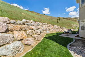 View of yard with a patio