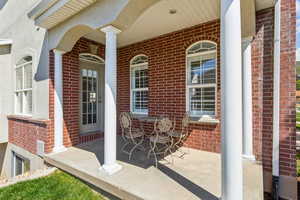 View of patio with a porch