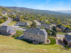 Birds eye view of property featuring a residential view and a mountain view