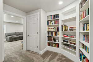 Sitting room featuring baseboards, carpet flooring, and recessed lighting
