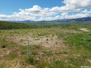 Property view of mountains with a rural view