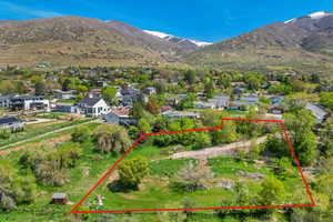 Drone / aerial view with a mountain view and a residential view