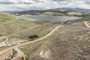 Bird's eye view featuring a water and mountain view